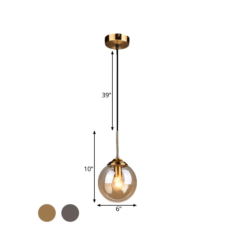 Dimbare Spot 1-lichts eetkamer plafondhanger eenvoudige messing hanglamp met bolvormige amber/rookglazen kap