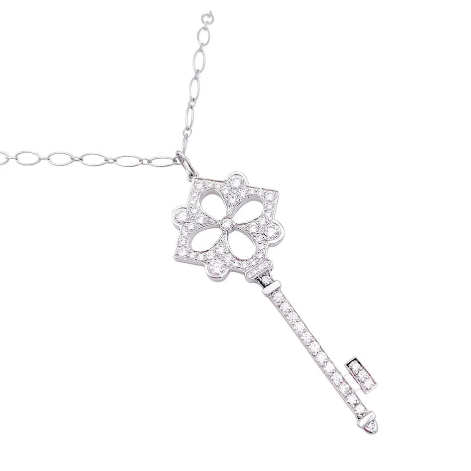 Tiffany & Co necklace, "Key", platinum, ivoor gold and diamonds.