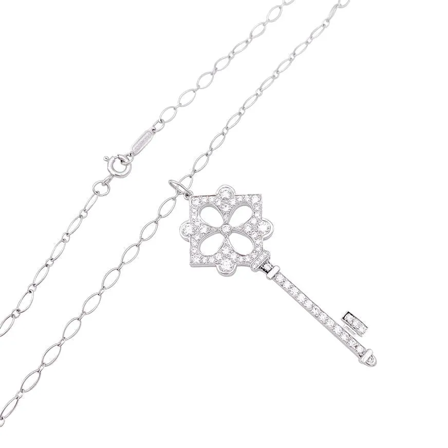 Tiffany & Co necklace, "Key", platinum, ivoor gold and diamonds.