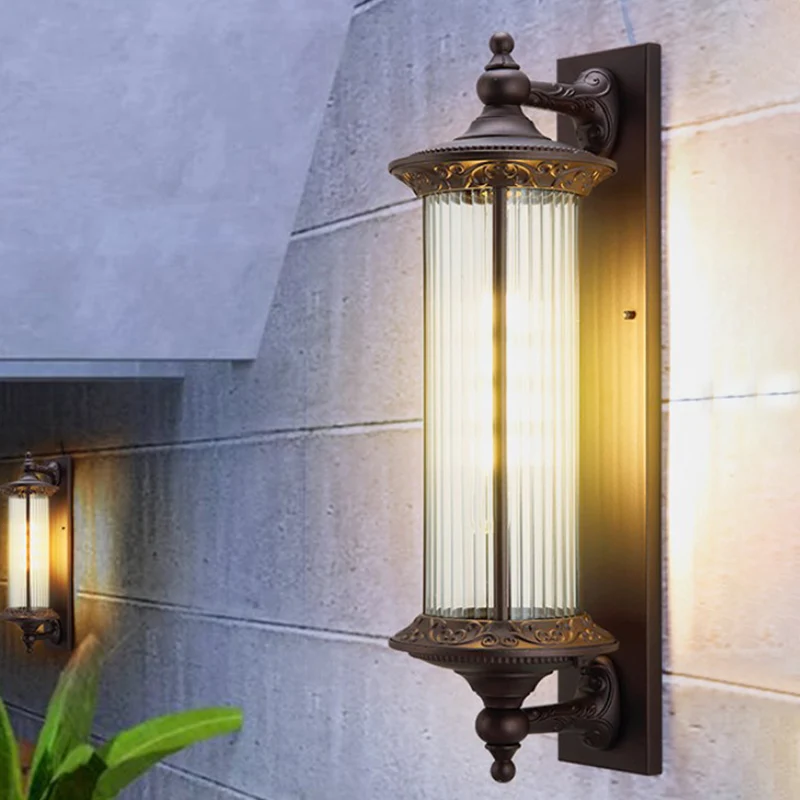 1-lichts schansland buitenlamp voor wandmontage met cilindervormige helder geribbelde glazen kap donkere koffie Clearhalo