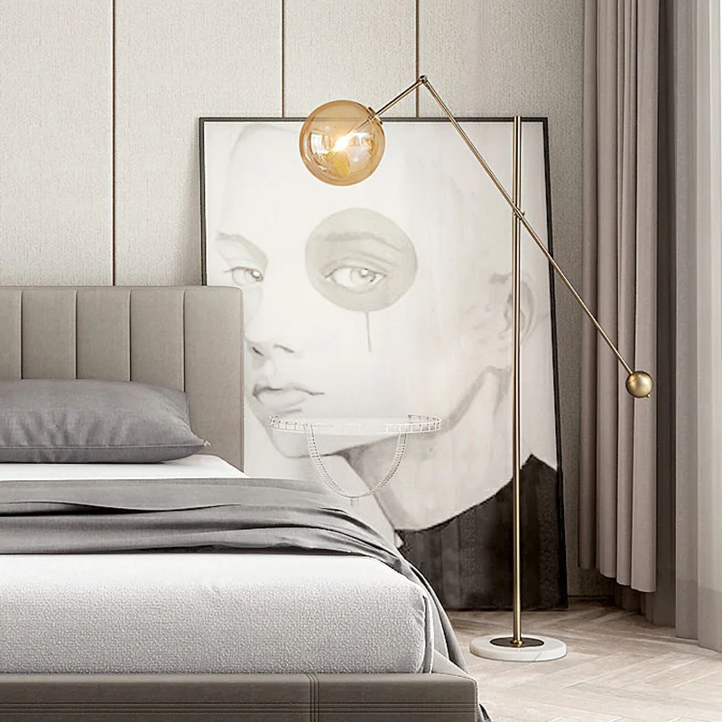 Amberkleurige glazen bol vloerlamp Simplicity 1-lichts bronzen staande lamp met balansarm Clearhalo