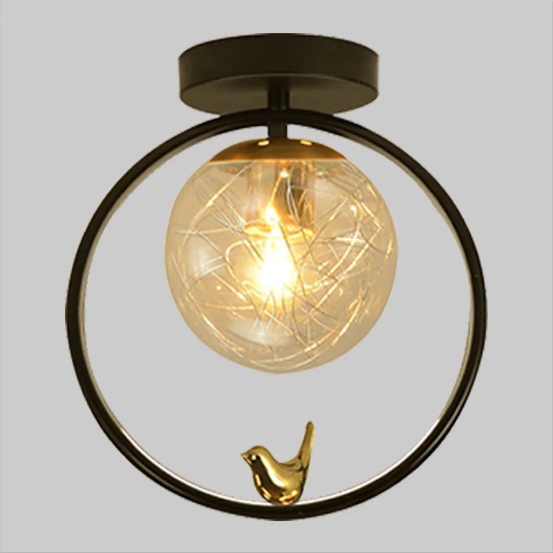 Bolvormig semi-inbouwlicht eigentijds helder glas, enkele lamp, zwart plafondmontagearmatuur met wereldbol/vogeldecor Clea...