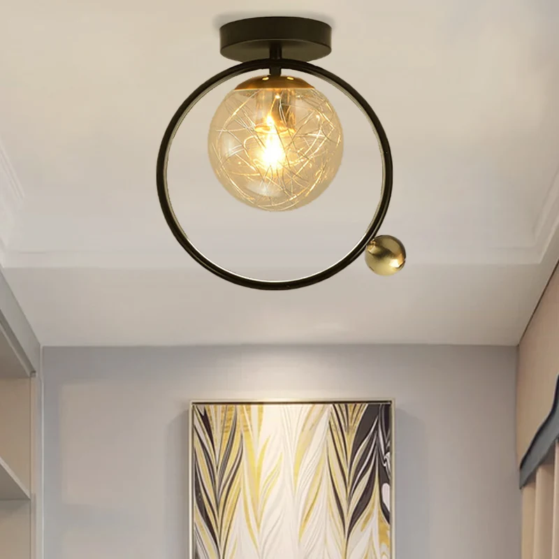Bolvormig semi-inbouwlicht eigentijds helder glas, enkele lamp, zwart plafondmontagearmatuur met wereldbol/vogeldecor Clea...