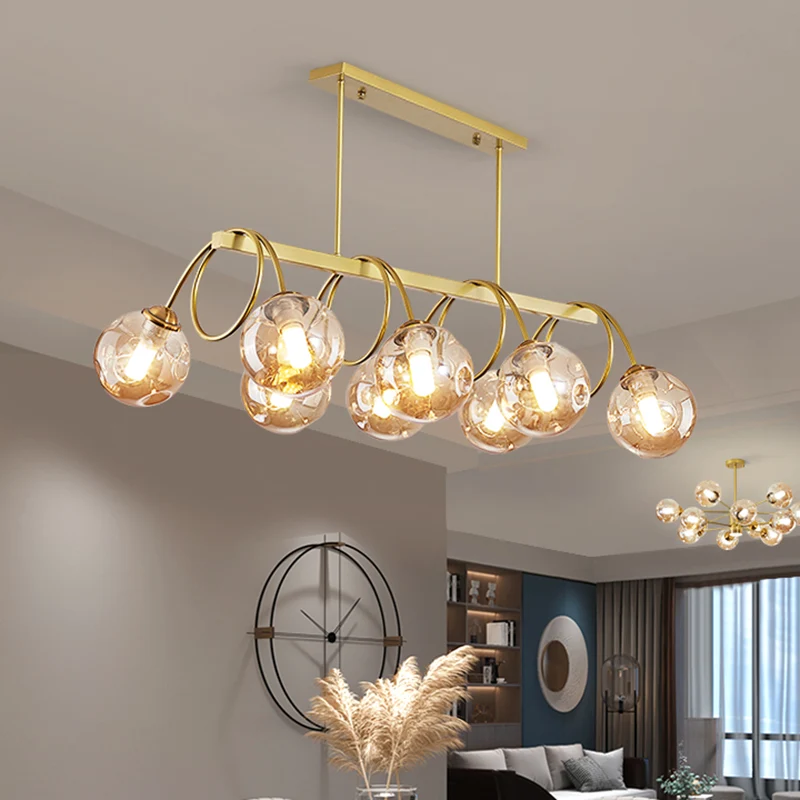 Goudkleurige spiraalvormige eilandlamp, postmoderne metalen plafondhanglamp met bolvormige glazen kap Clearhalo