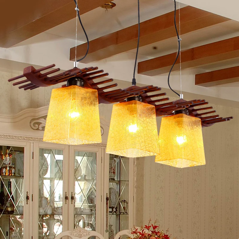 3 Heads Island Light rustieke eetkamer houten hanglamp met trapeziumvormige gele craquelé glazen kap bruin Clearhalo