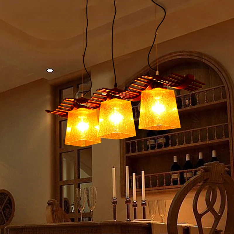 3 Heads Island Light rustieke eetkamer houten hanglamp met trapeziumvormige gele craquelé glazen kap bruin Clearhalo