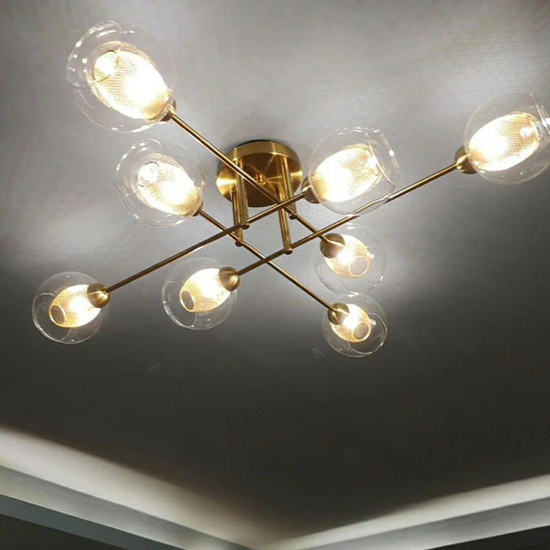 Helderglazen bolvormige plafondlamp, postmoderne gouden afwerking, semi-gemonteerde verlichting met gaasscherm aan de binn...