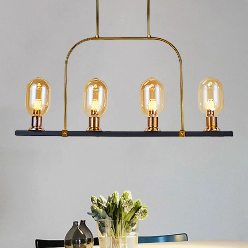 Lampachtige eilandverlichting Post moderne amberkleurige glazen 4-lichts zwart-gouden hangende plafondlamp met metalen fra...