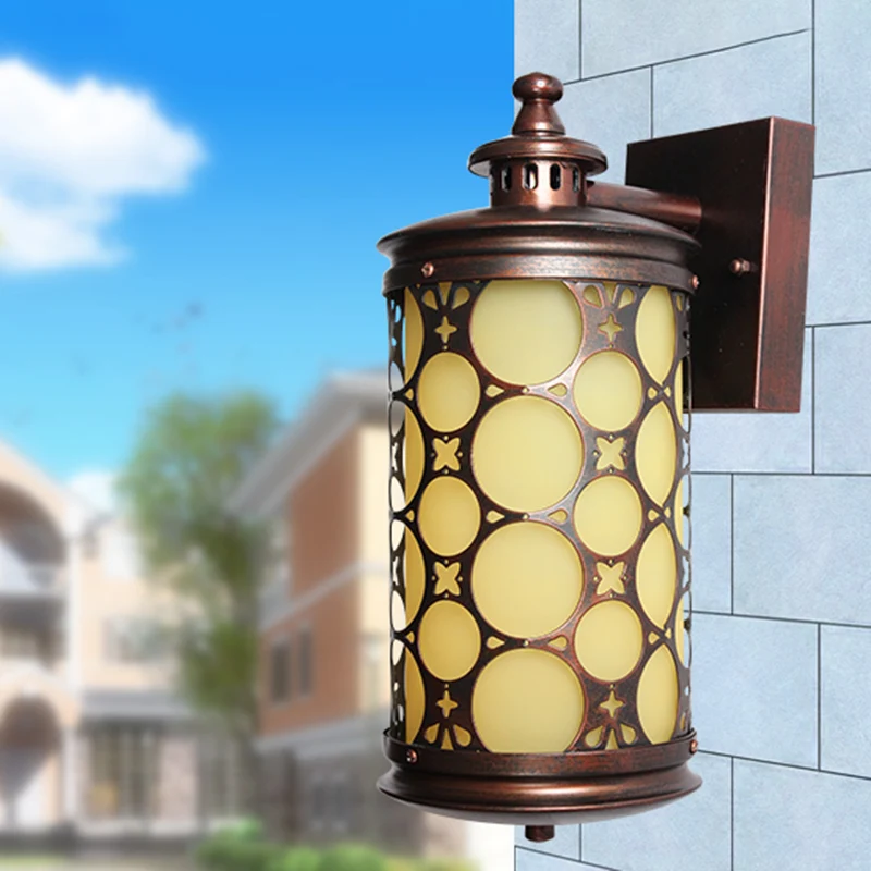 Landelijke cilinderwandkandelaarlamp, enkele lichtgeel glazen wandlamp brons met cirkelontwerp Clearhalo