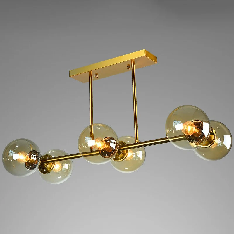 Messing lineaire eilandlamp, postmodern metalen plafondlamp met bolvormige glazen kap Clearhalo