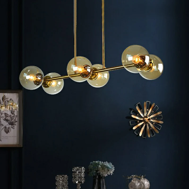 Messing lineaire eilandlamp, postmodern metalen plafondlamp met bolvormige glazen kap Clearhalo
