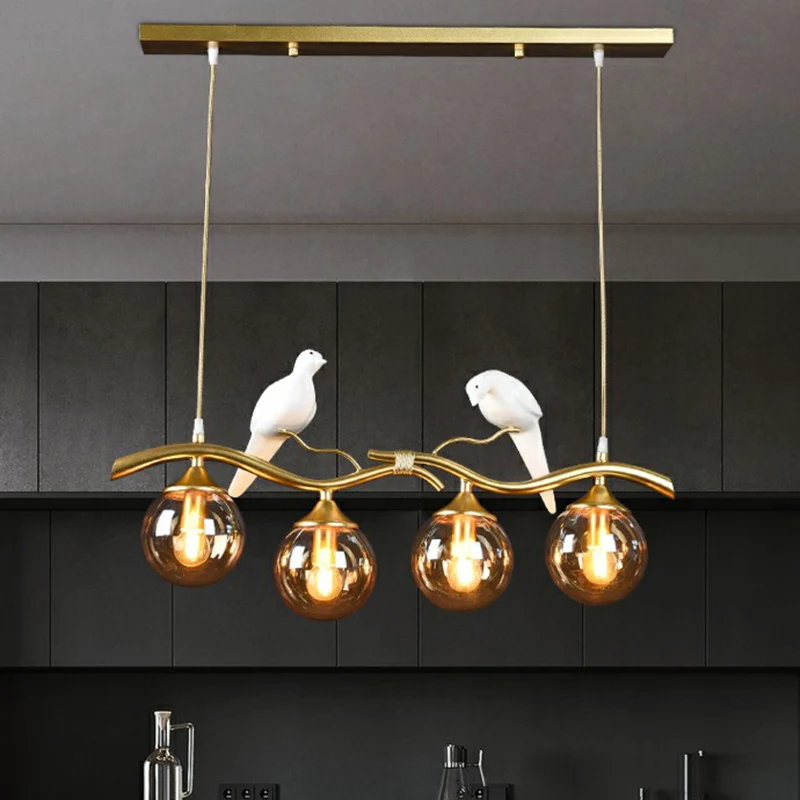 Minimalistische Branch Island Lighting Metalen 4-lichts eetkamer hanglamp met bolglazen kap en vogeldeco Clearhalo