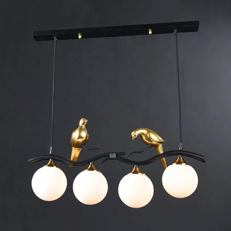 Minimalistische Branch Island Lighting Metalen 4-lichts eetkamer hanglamp met bolglazen kap en vogeldeco Clearhalo