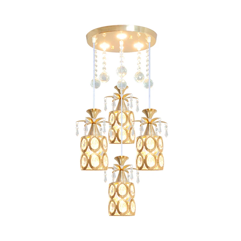 Moderne 4-lichts multi-plafondlamp met kristallen ingebedde kap en cilinderhanger met gouden afwerking Clearhalo