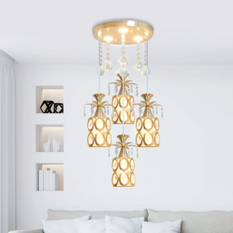 Moderne 4-lichts multi-plafondlamp met kristallen ingebedde kap en cilinderhanger met gouden afwerking Clearhalo