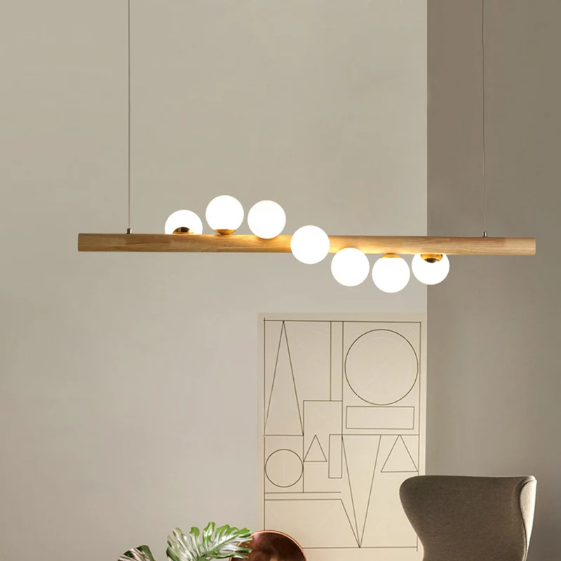 Noordse lineaire houten eilandhanger met bolvormig glazen eilandlicht beige voor eetkamer Clearhalo