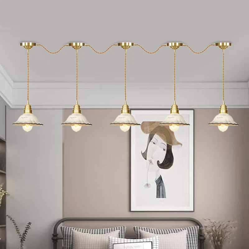 Traditionele geschulpte meervoudige hanglamp 3/5/7-lamps keramische hanglamp goud met serieverbindingsontwerp Clearhalo