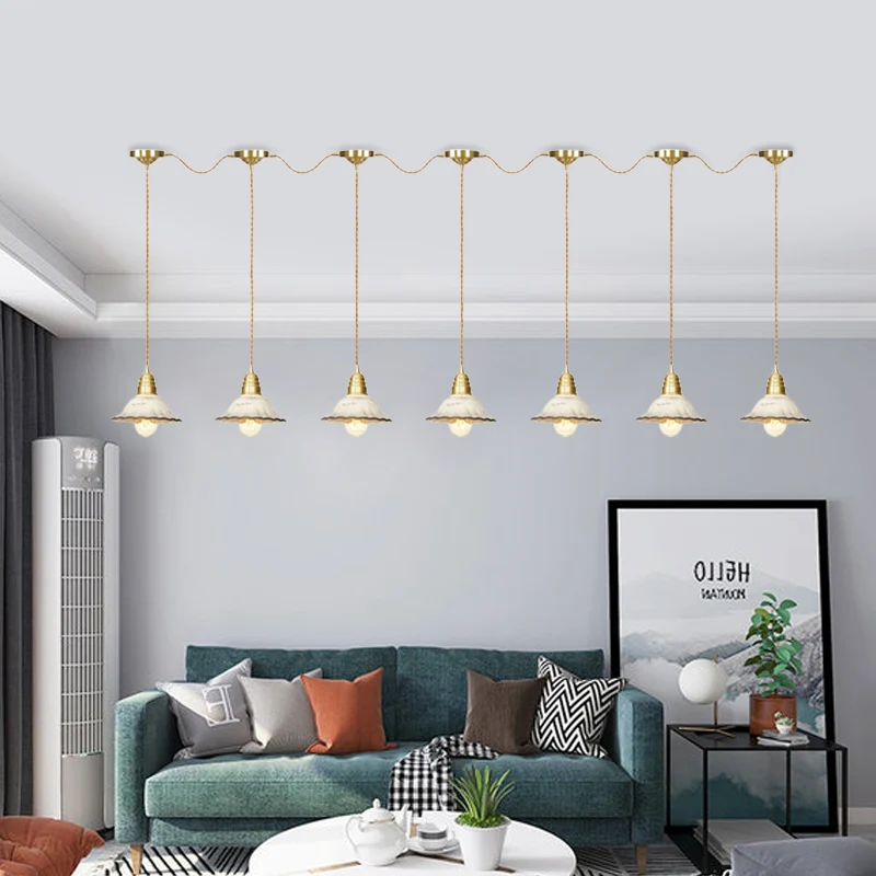 Traditionele geschulpte meervoudige hanglamp 3/5/7-lamps keramische hanglamp goud met serieverbindingsontwerp Clearhalo