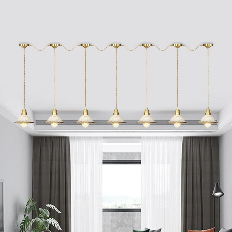 Traditionele geschulpte meervoudige hanglamp 3/5/7-lamps keramische hanglamp goud met serieverbindingsontwerp Clearhalo