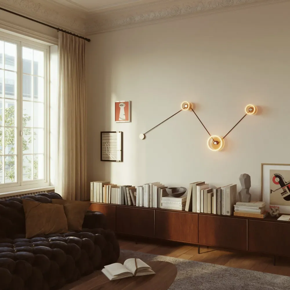 Wandlamp Spostaluce met 3 Ghost lichtbronnen en zwart-goud strijkijzersnoer