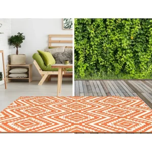 Binnen- buitentapijt etnische stijl CAREA - 150 x 200 cm - Oranje - Koop nu onopgesmukt